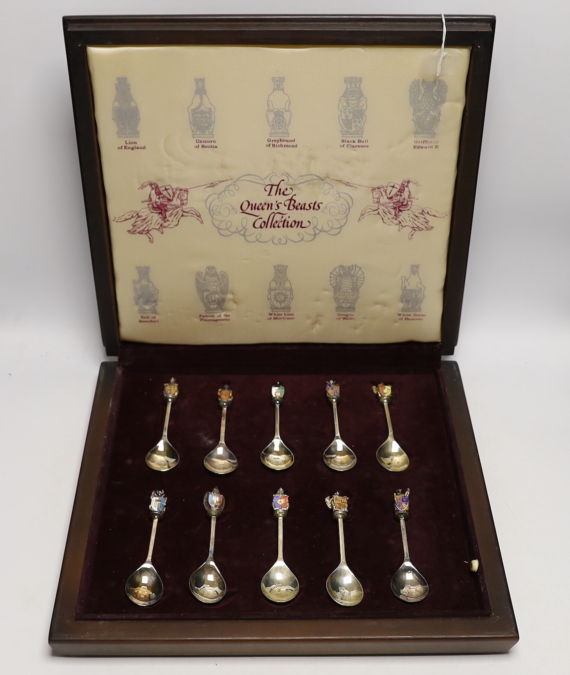 A Queen Elizabeth II Limited Edition cased set of ten 'The Queen's Beasts Collection' silver and enamel spoons, Toye, Kenning & Spencer, London, 1977, 14cm, numbered 929/2500.